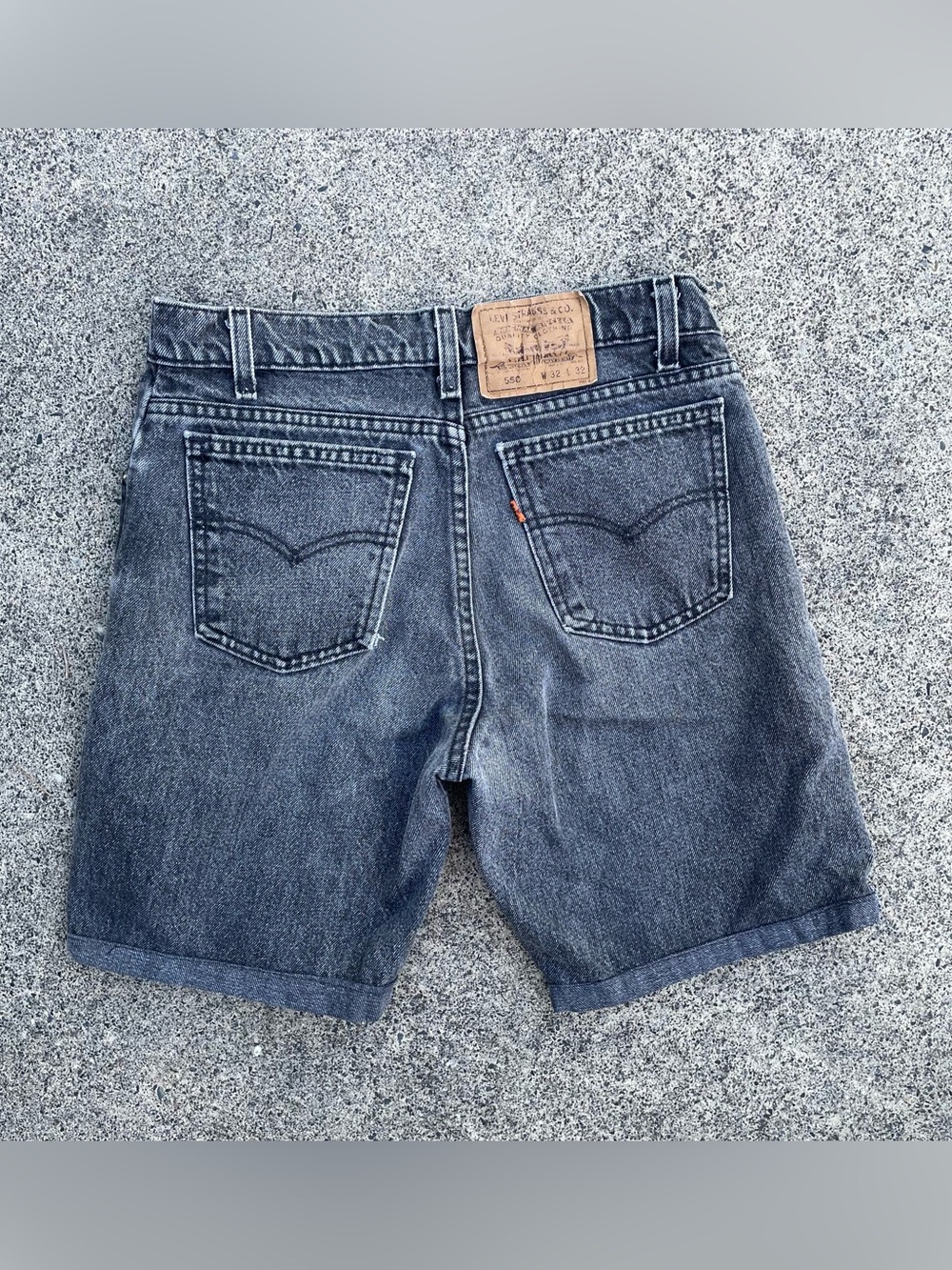 Vintage orange tab Levi’s black denim shorts size 31”